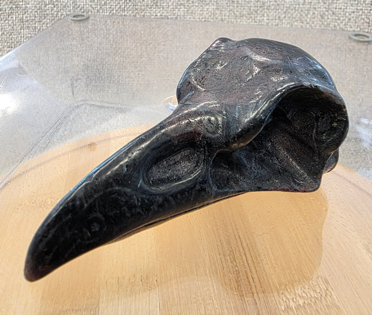 Astrophylite with Garnet Crow Skull